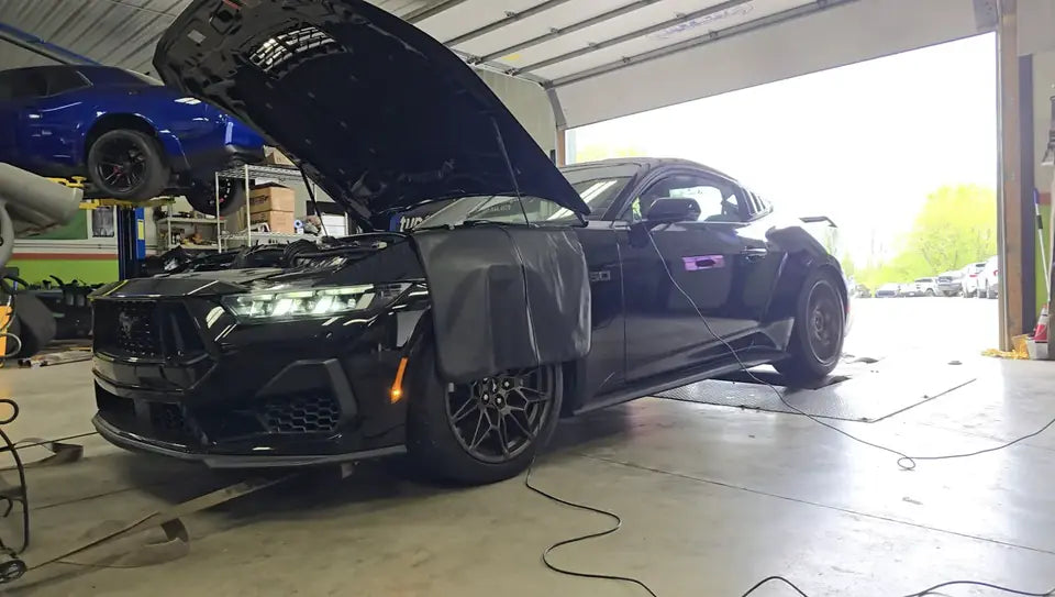 Ford Mustang strapped to the Satera Tuning dyno